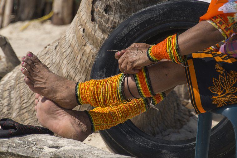 Woman in San Blas Island Guna tribe doing traditional textile work
