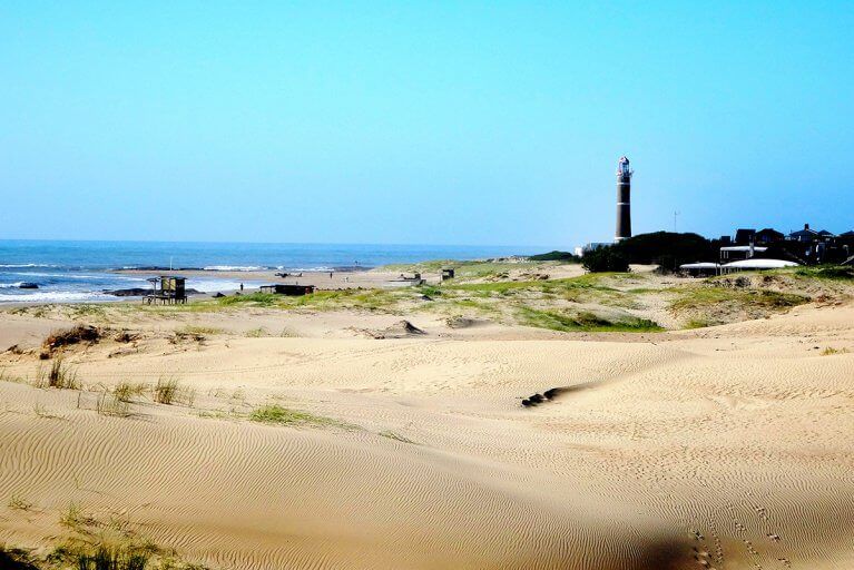 Sand dunes, beach, and Jose Ignacio lighthouse during luxury Uruguay trip