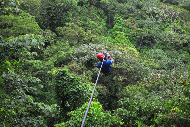 Zipline through the canopy during a private tour of Costa Rica