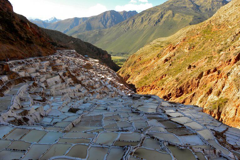 Shallow, rectangular, terraced salt ponds used to harvest salt in the shade on a mountainside near Maras village