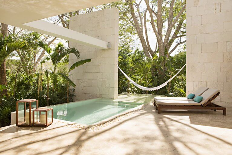 Private hammock and pool at the King Villa Exterior in Chable Yucatan, a preferred resort for a luxury Mexico tour