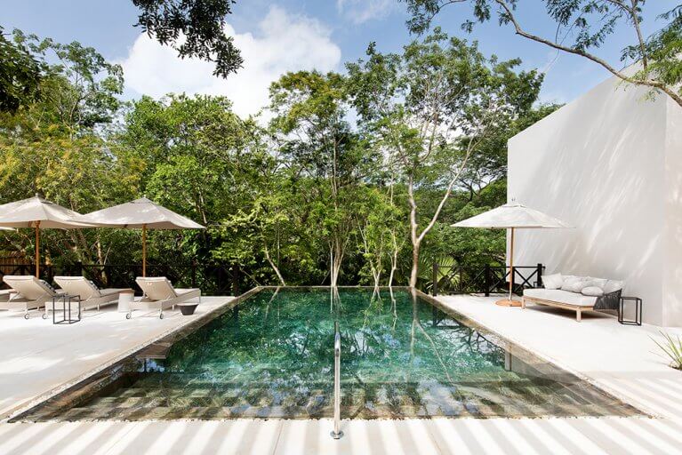 Outdoor pool at the spa of the Chable Yucatan resort, a luxurious hotel in Mexico