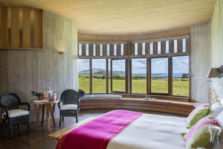 Luxury suite at Explora hotel with a view of Easter Island's natural landscape