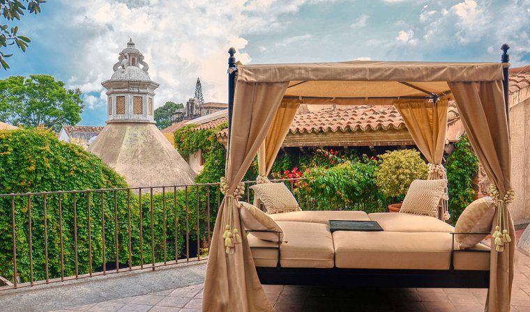 Daybed on a terrace at the El Convento hotel in Antigua, Guatemala