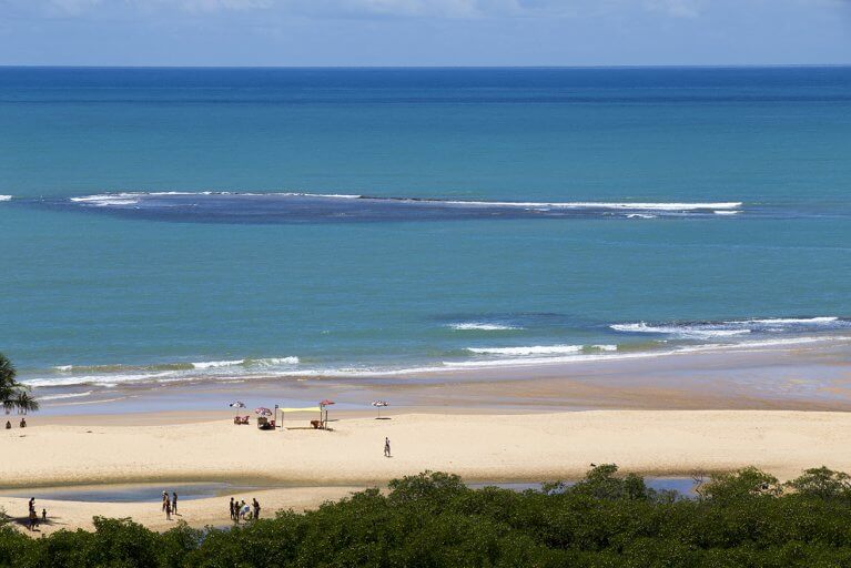 Looking out onto Trancoso Beach and aquamarine water