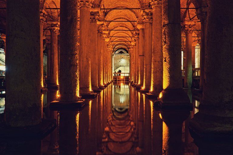 Dimly lit ancient cistern below a Byzantine basilica in Turkey