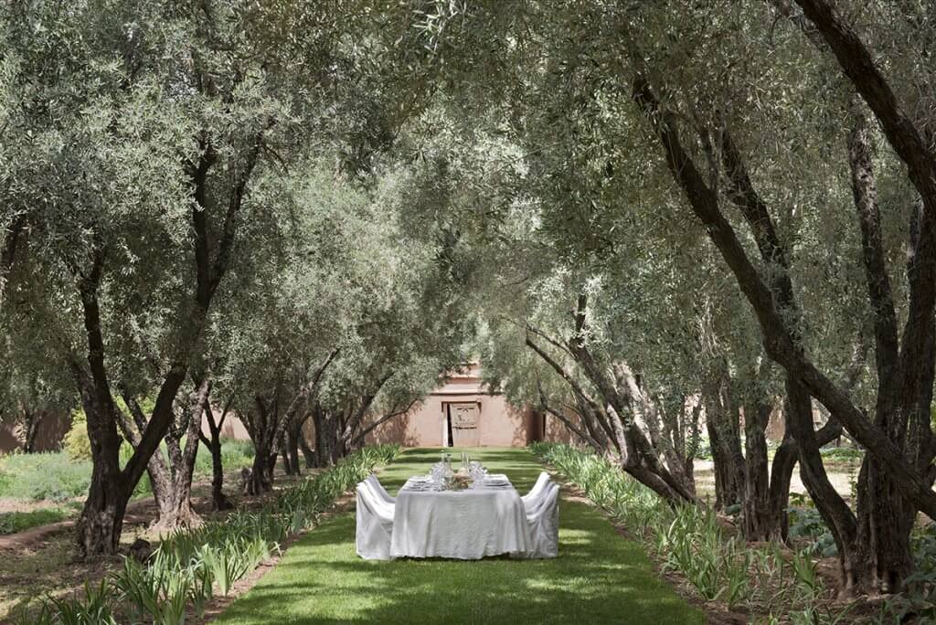 Private outdoor lunch set-up in the gardens of Dar Ahlam hotel