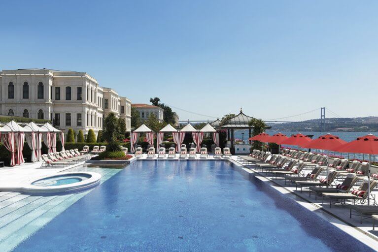 Outdoor pool at the Four Seasons hotel with a view of Bosphorus river in Istanbul, Turkey