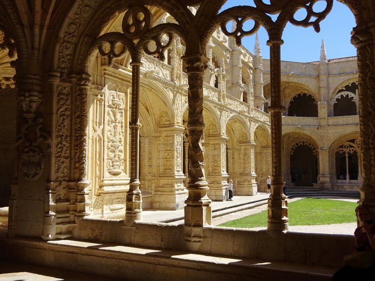 Intricately carved archways in the cloister at the Jeronimos Monastery in Belem, Portugal