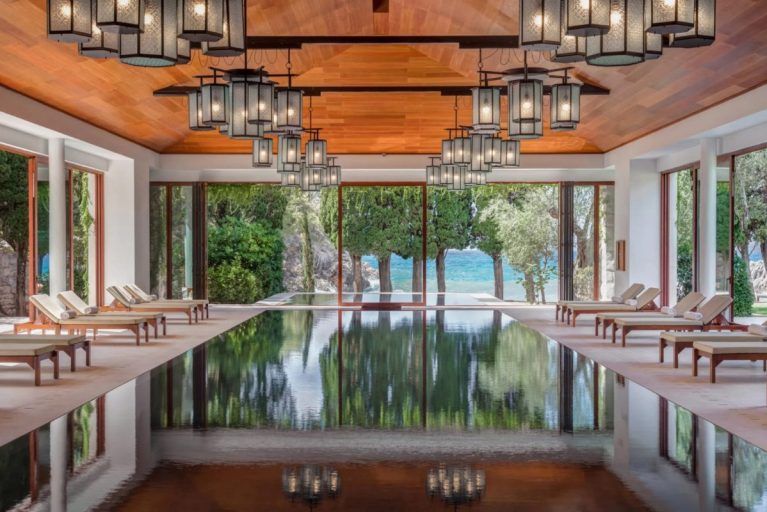 Indoor swimming pool with stunning view at Aman Sveti Stefan