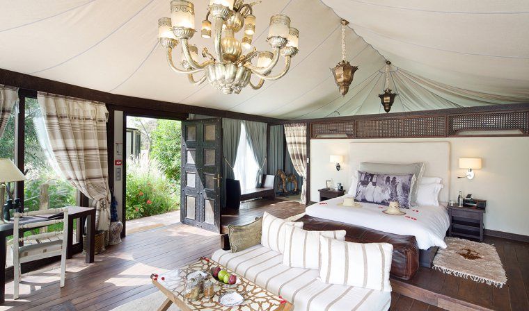 Interior view of a luxury tent at Kasbah Tamadot Resort in the Atlas Mountains