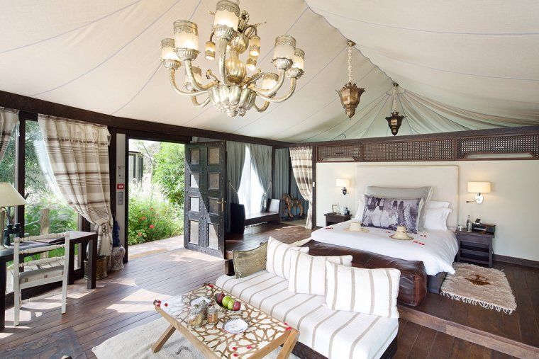 Interior view of a luxury tent at Kasbah Tamadot Resort in the Atlas Mountains