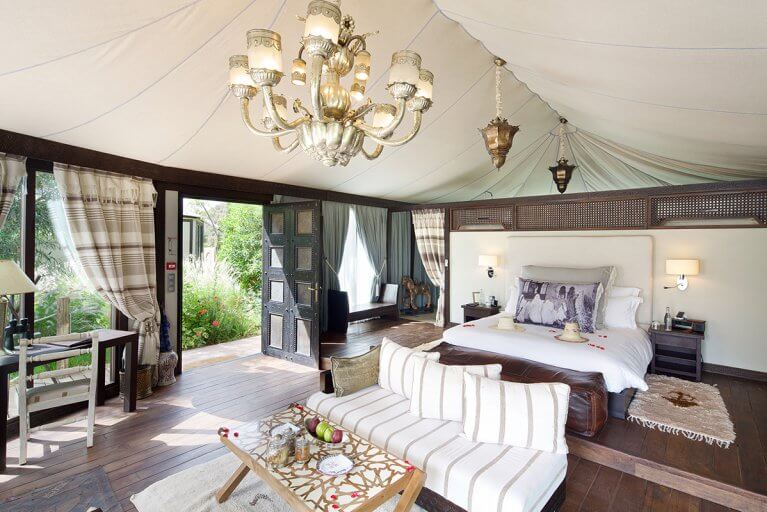 Interior view of a luxury tent at Kasbah Tamadot Resort in the Atlas Mountains