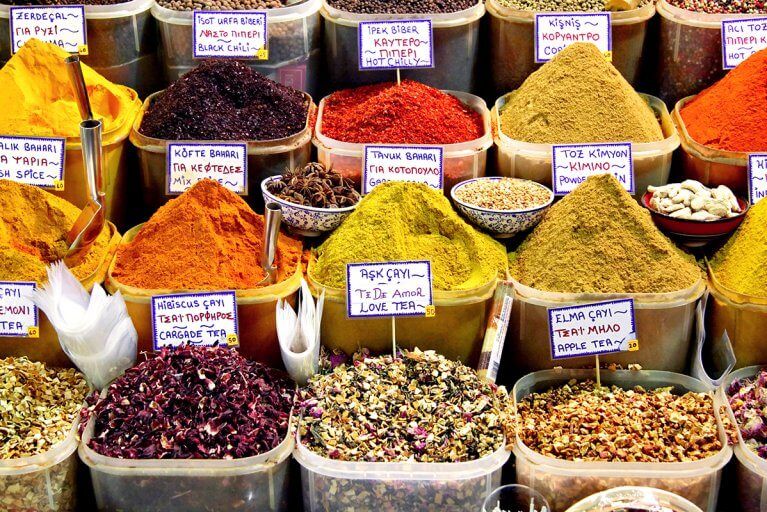Open spice containers at the Istanbul market in Turkey