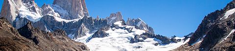 Turquoise glacial lake at the base of the jagged peaks of Mount Fitz Roy