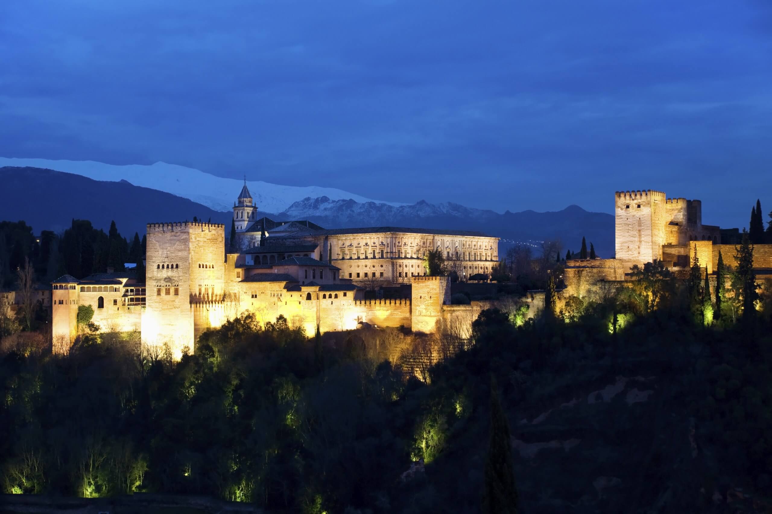 Alhambra lit up at night in Granada, Spain