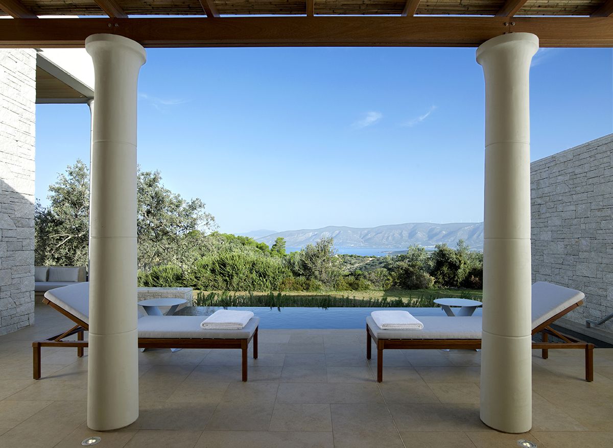 Private infinity pool of Deluxe Pavilion with view of countryside at Amanzoe luxury hotel on Peloponnese peninsula