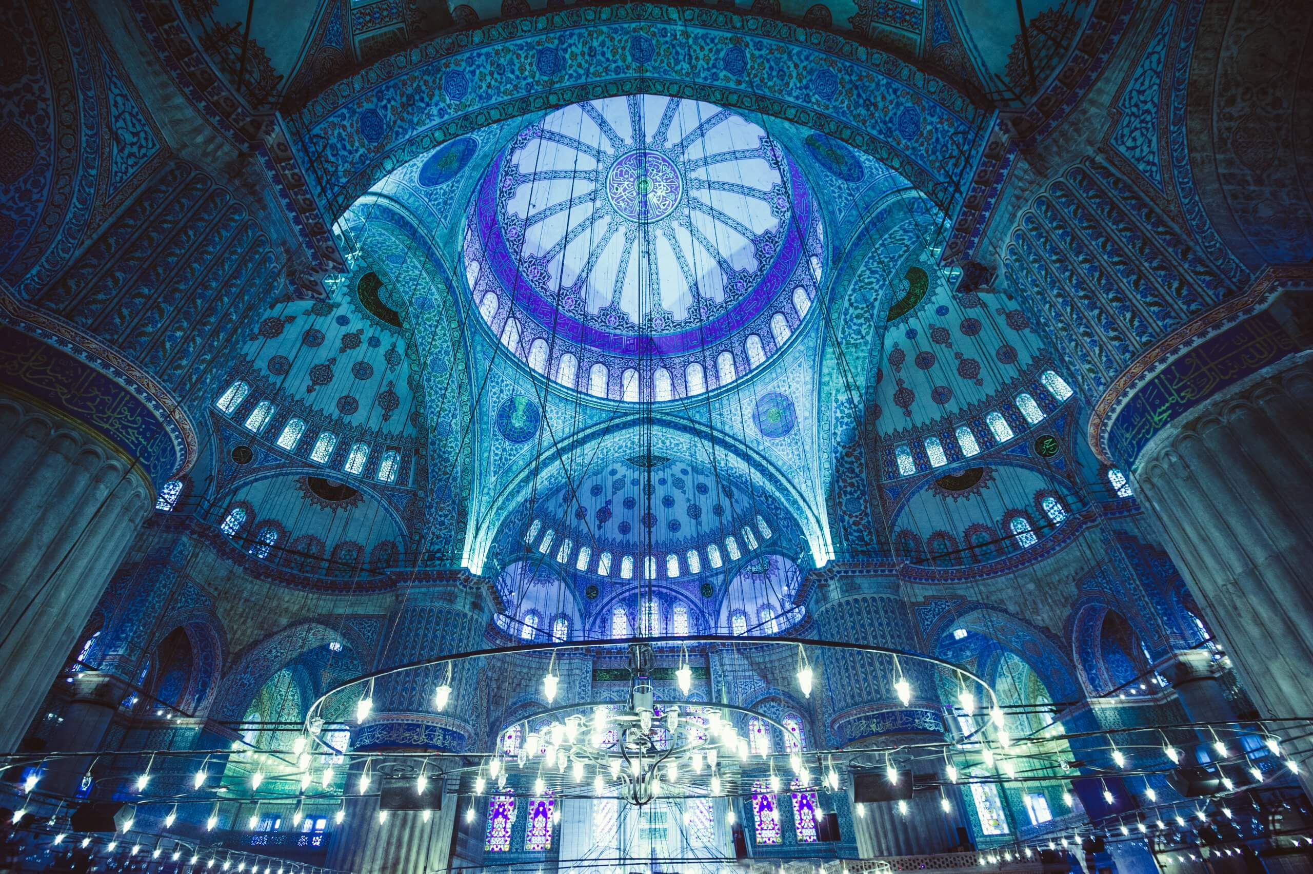 Ornately decorated interior of domes of the Blue Mosque in Istanbul, Turkey