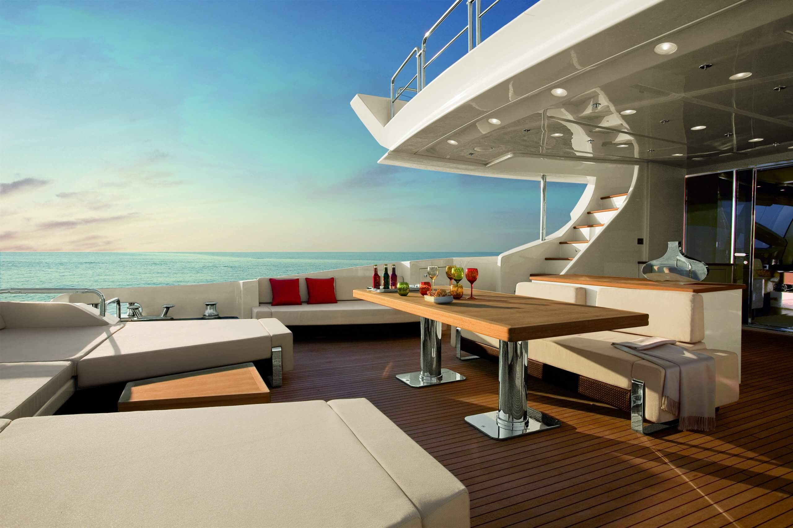 Aft deck with large table on a luxury yacht cruising between Greek islands