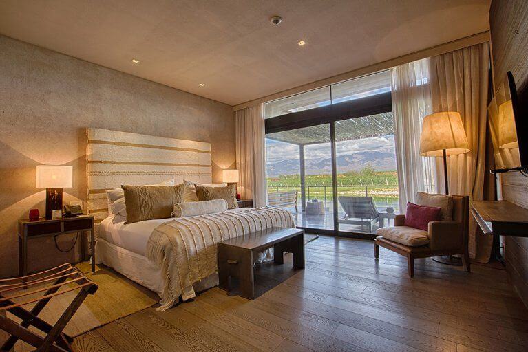 Bedroom with a balcony of a luxury villa at The Vines Resort in Mendoza, Argentina