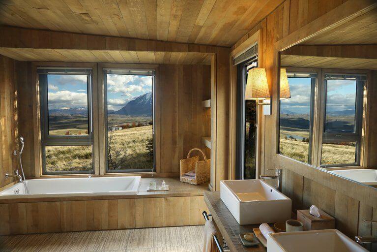 Luxurious bathroom two sinks and view of landscape at Awasi Lodge in Patagonia, Chile