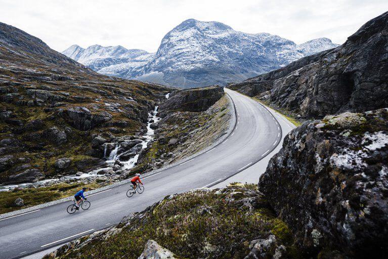 Summertime biking excursion along a curving mountain road