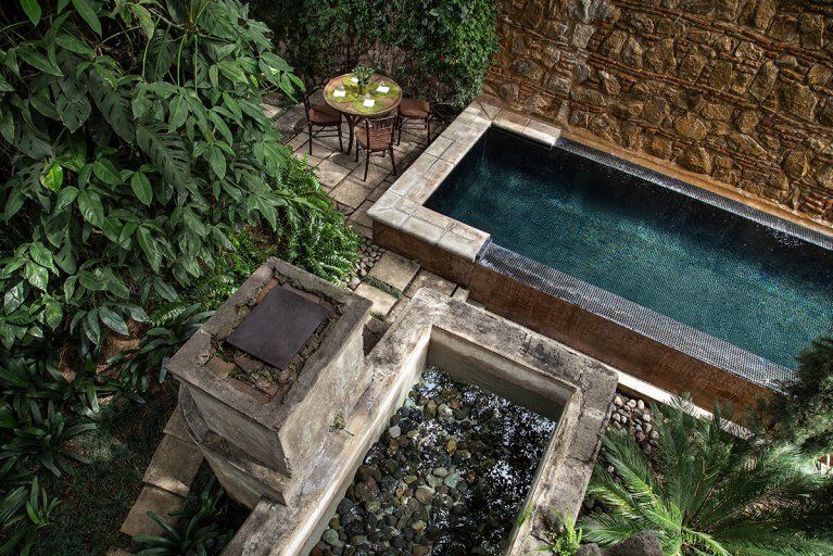 Aerial view of the outdoor pool at El Convento Hotel, a recommended stop during a private tour of Guatemala