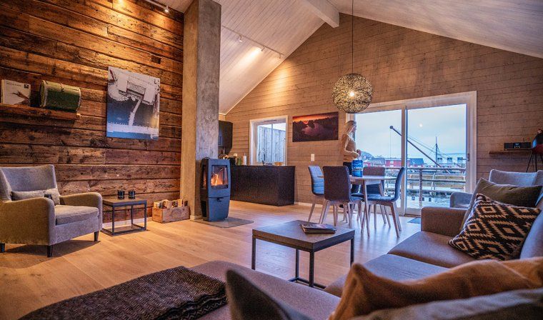 Interior of a cozy wooden cabin at Hattvika Lodge