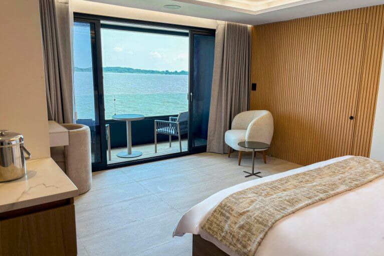 Large cabin on luxury catamaran with balcony and ocean view of the Galapagos Islands