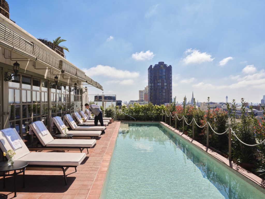 View of rooftop pool at Barcelona's luxury Hotel El Palace