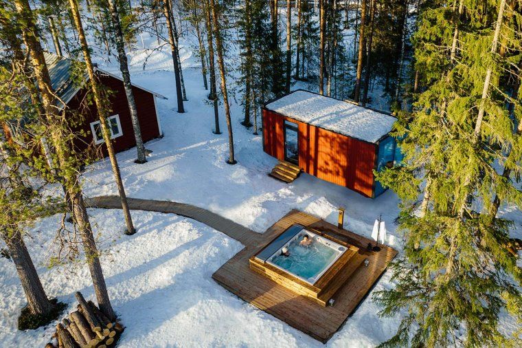 Aerial view of luxury wilderness lodge and private outdoor jacuzzi