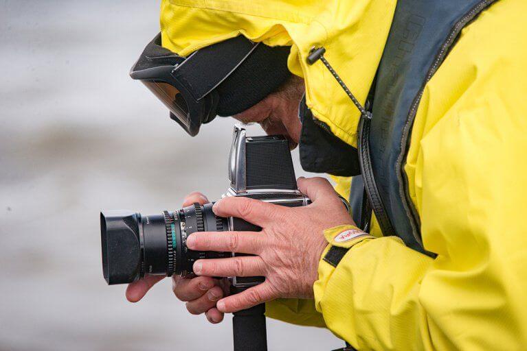 Man Taking Photo During Antarctica Luxury Cruise
