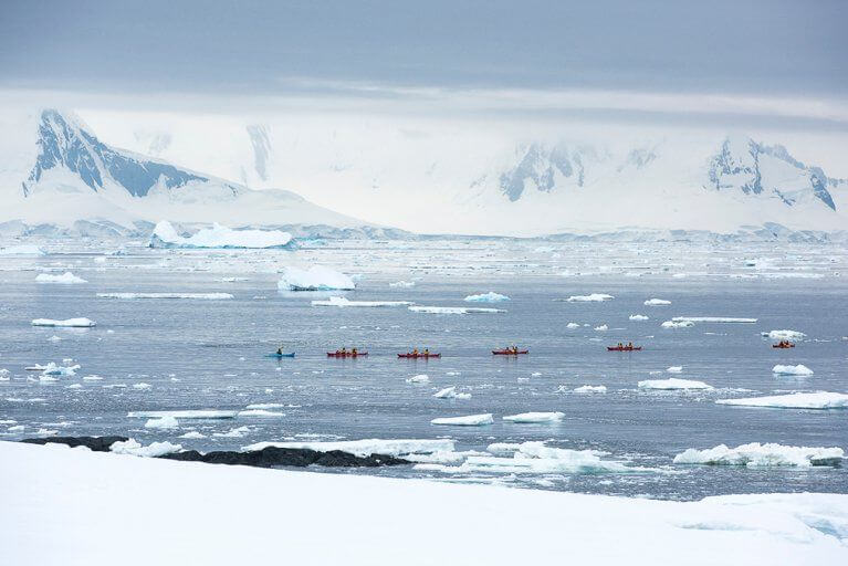 People Sea Kayaking Icebergs Antarctica