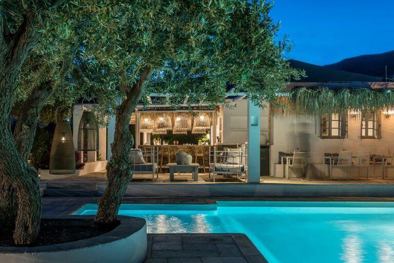 Outdoor pool and seating area at Verina Terra luxury hotel on Sifnos Island in Greece