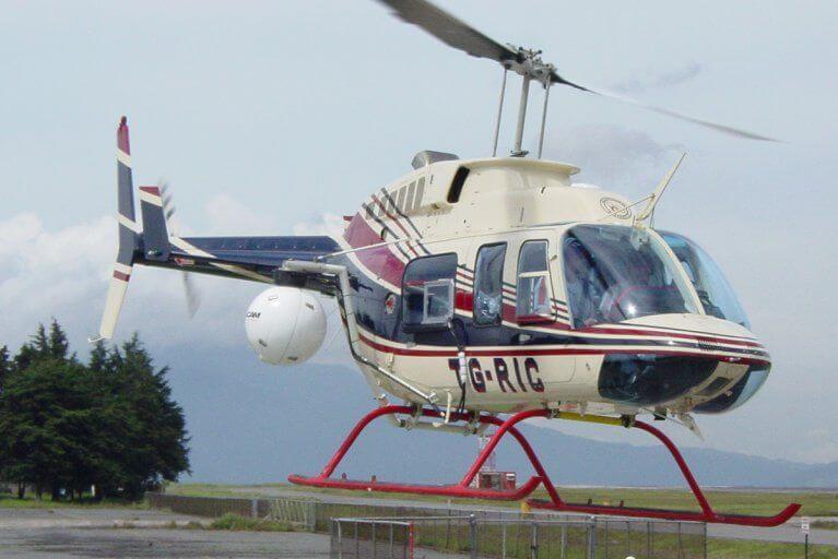 Private helicopter transfer during a luxury Guatemala tour