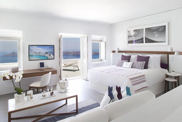 White suite with a view of Aegean sea at Grace luxury hotel in Santorini