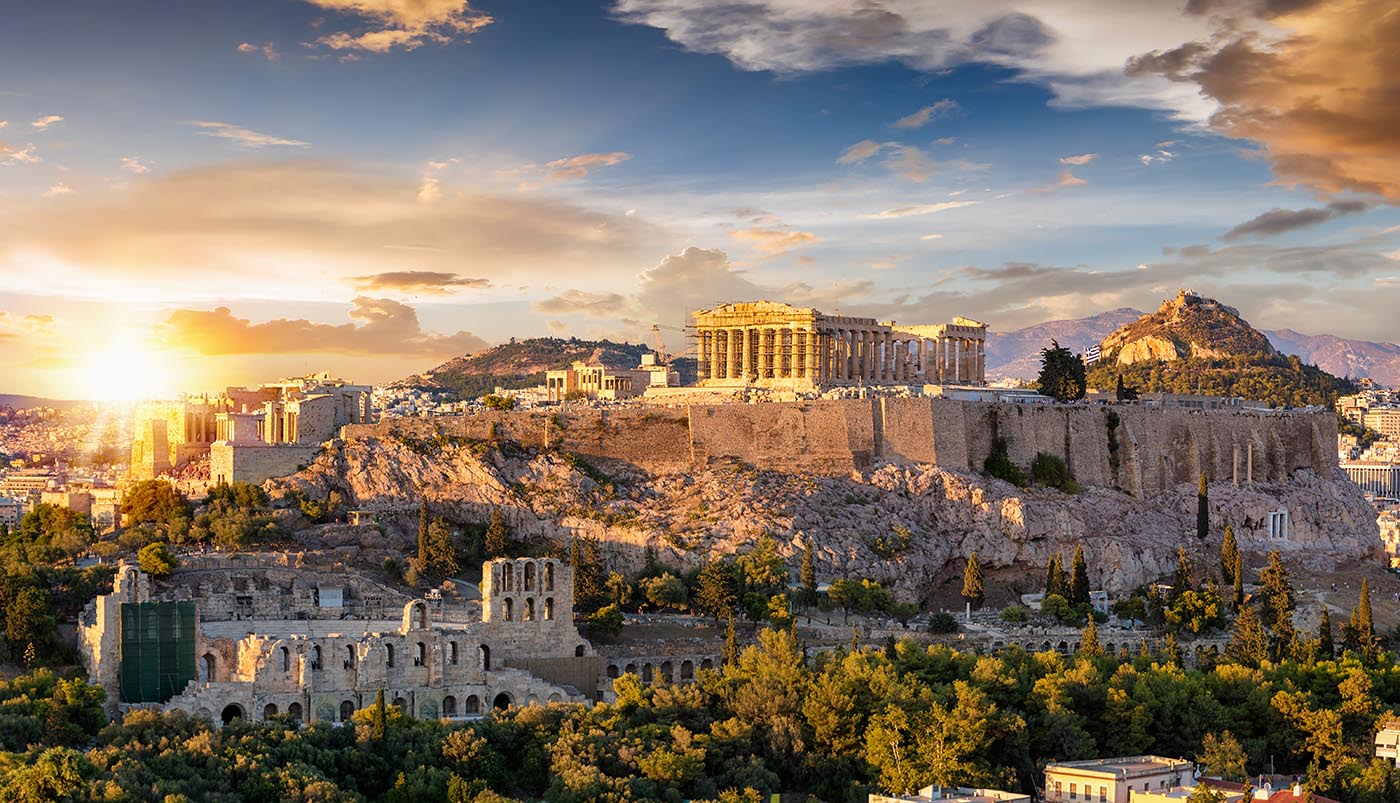 Panorama view of sunrise over the ancient Acropolis of Athens in Greece
