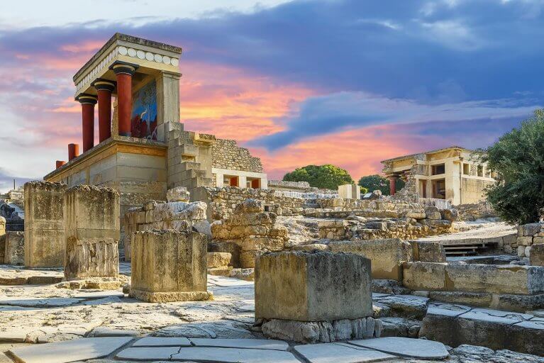 Panorama views of pink sunset at the Bronze Age Knossos Palace in Crete