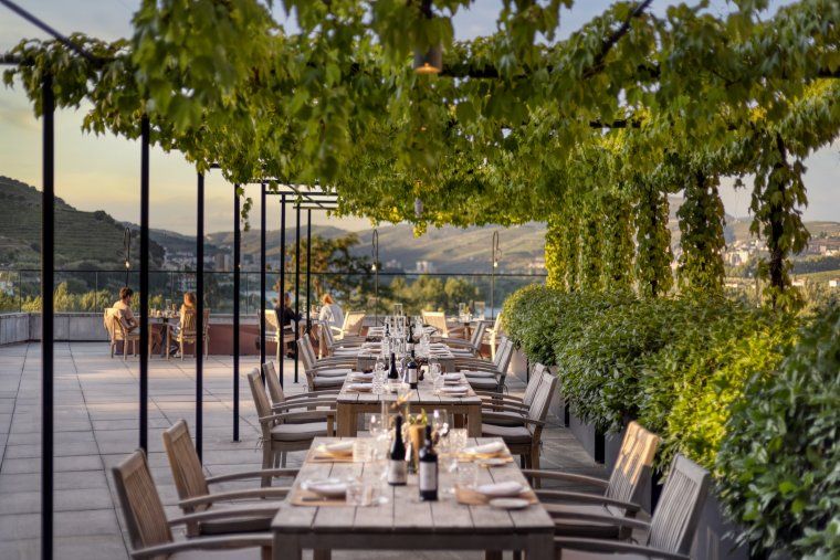 Outdoor seating at fine dining restaurant at Six Senses Hotel in Douro Valley in Portugal