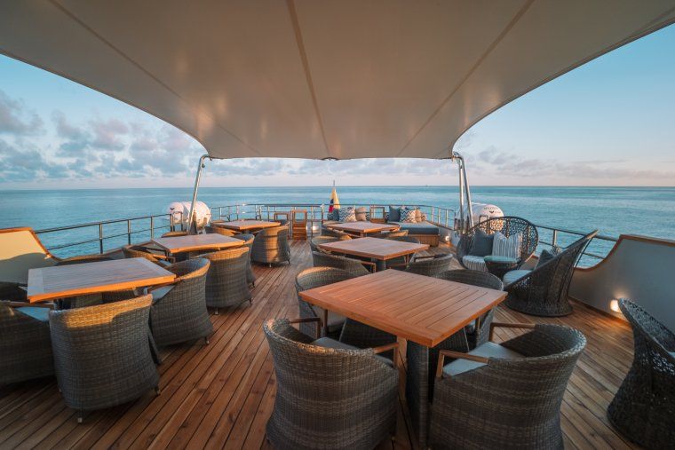 View of Galapagos Islands from sun deck on private luxury yacht