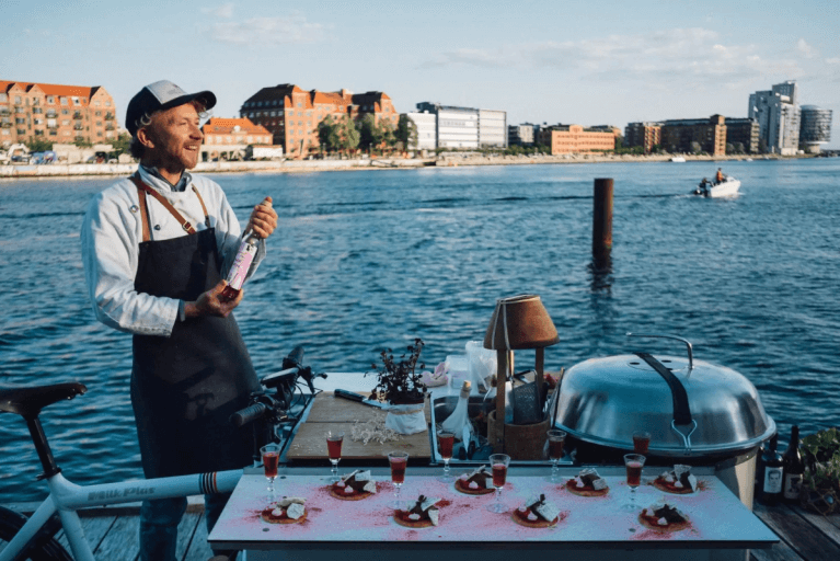 Private chef leading a unique, gourmet culinary biking tour through Copenhagen in Denmark