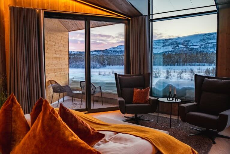 Luxury suite with views of Arctic landscapes surrounding Sorrisniva Arctic Wilderness Lodge