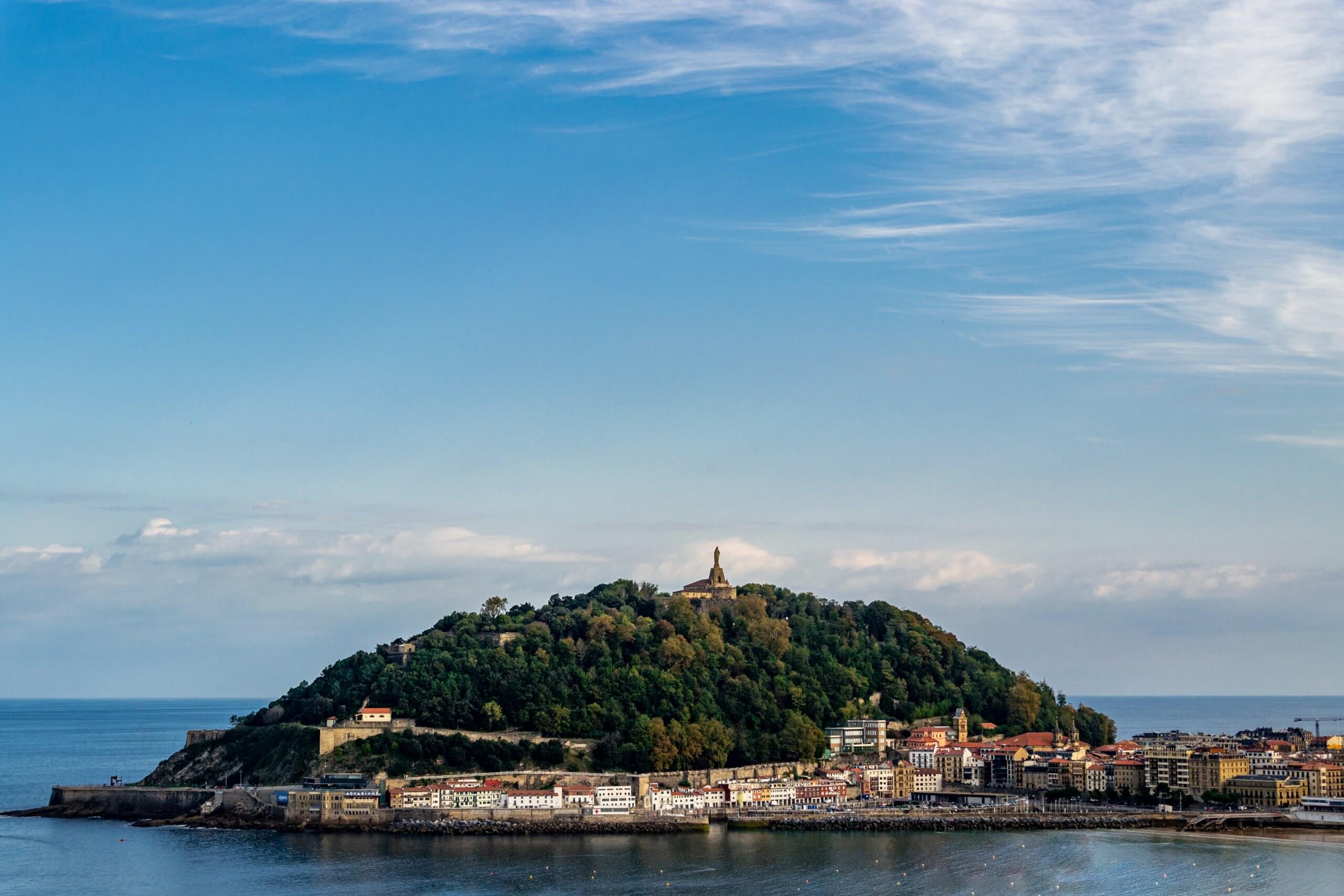 View of Monte Urgull in the middle of the ocean in San Sebastian in the Basque Country