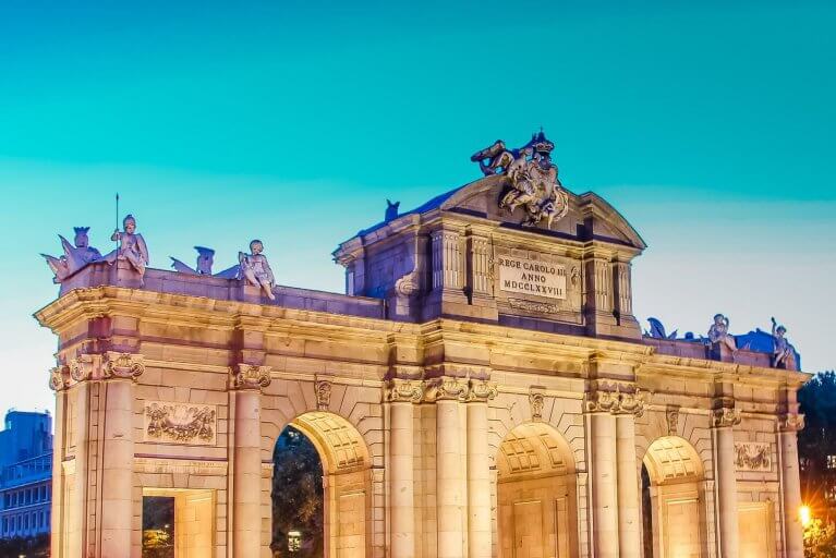 Puerta de Alcala lit up at night in Spain