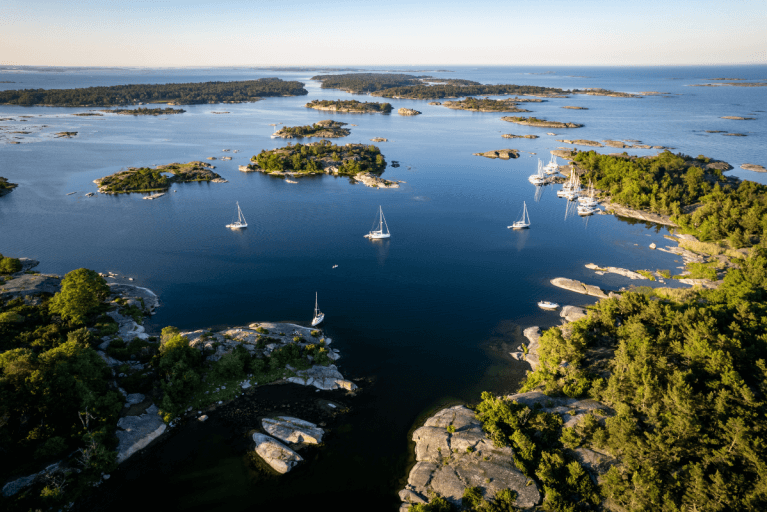 Aerial view of private yachts in Stockholm Archipelago during summer months