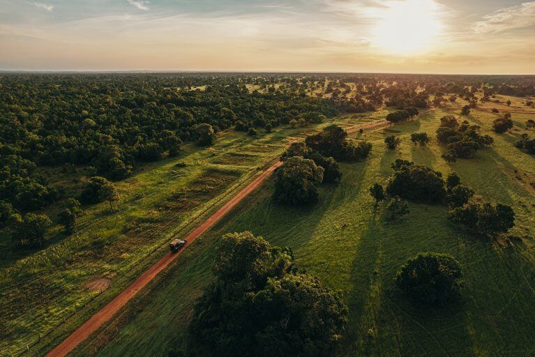 Aerial view of 4x4 driving through the grounds in Caiman Luxury Eco Lodge in Brazil