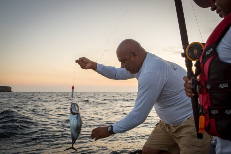 Man fishing from a private boat in Panama's Azuero Peninsula