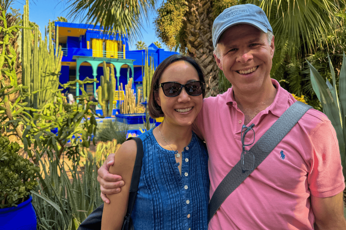 Two discerning travelers visiting the Majorelle Gardens in Morocco during bespoke private Morocco tour