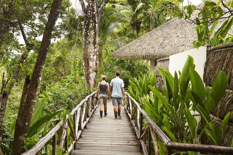 Couple walking through ecolodge grounds in Osa Peninsula
