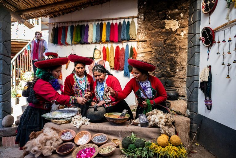 Peruvian women at a local stall in Cusco's San Pedro market
